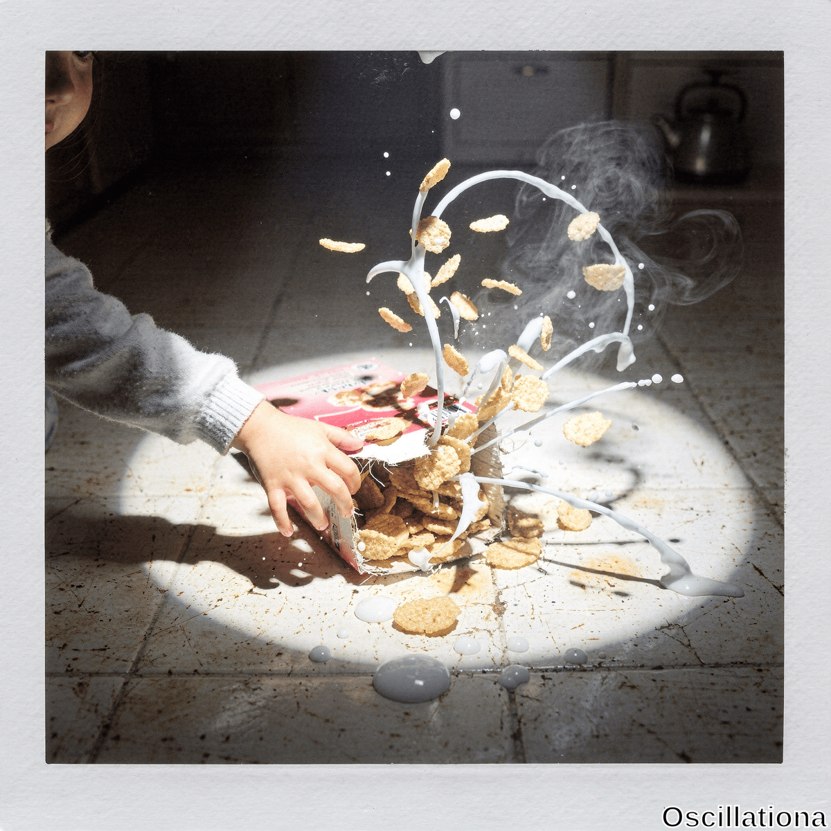 Dramatic Instax freeze-frame of child's hand in sweater spilling golden cornflakes from pink box & white milk splashing on beige terracotta tiles, steam rising amid long shadows from spotlight lighting.