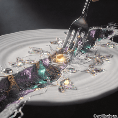 A white plate holds a surreal scene with a fork interacting with a golden cube at its center, surrounded by an explosion of vibrant glass or crystal fragments in purple, green, and gold